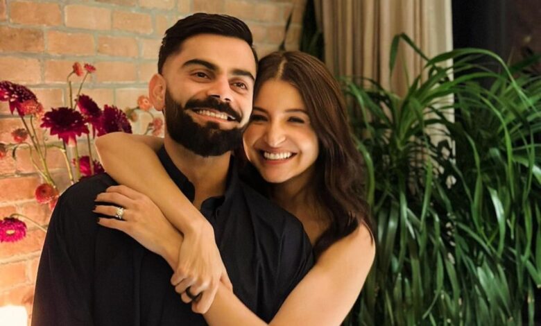 With her son Akaay, Anushka Sharma returns to India and gives paparazzi a peek, posing while the children aren't present.
