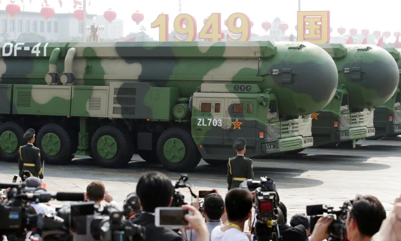 China holds rare test of long-range missile.