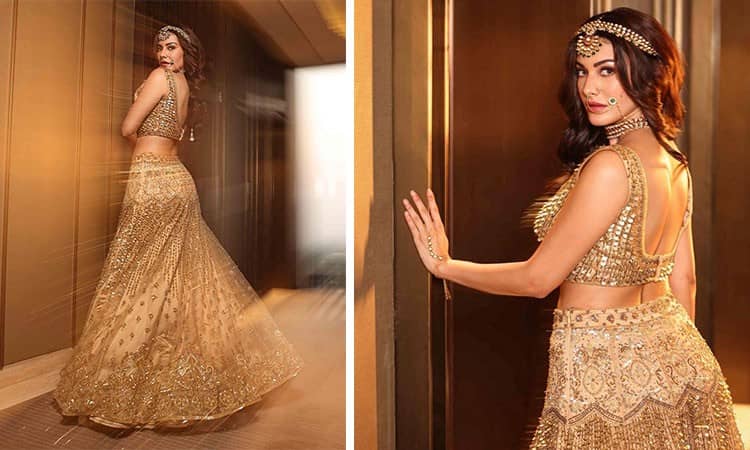 Amyra Dastur stuns in peach lehenga as showstopper at fashion event