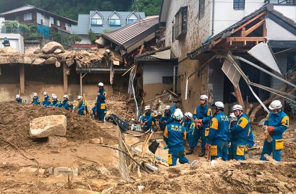 Japan orders mass evacuation as rains trigger floods in quake-hit region