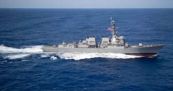 Houthi fighters launch missile and drone assault on US warships