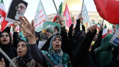 Regime change talk echoes among Iranians fleeing